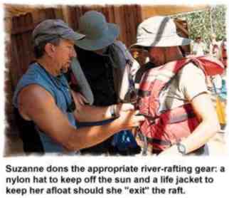 Suzanne dons the appropriate river-rafting gear: a nylon hat to keep off the sun and a life jacket to keep her afloat should she 